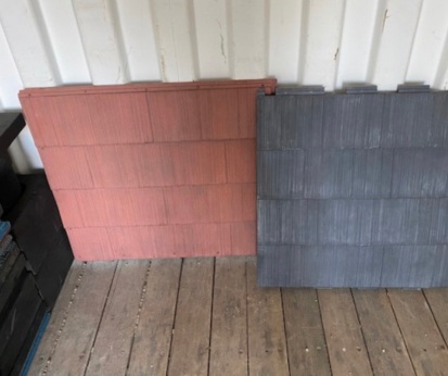 Red and gray Heveatek composite paver samples